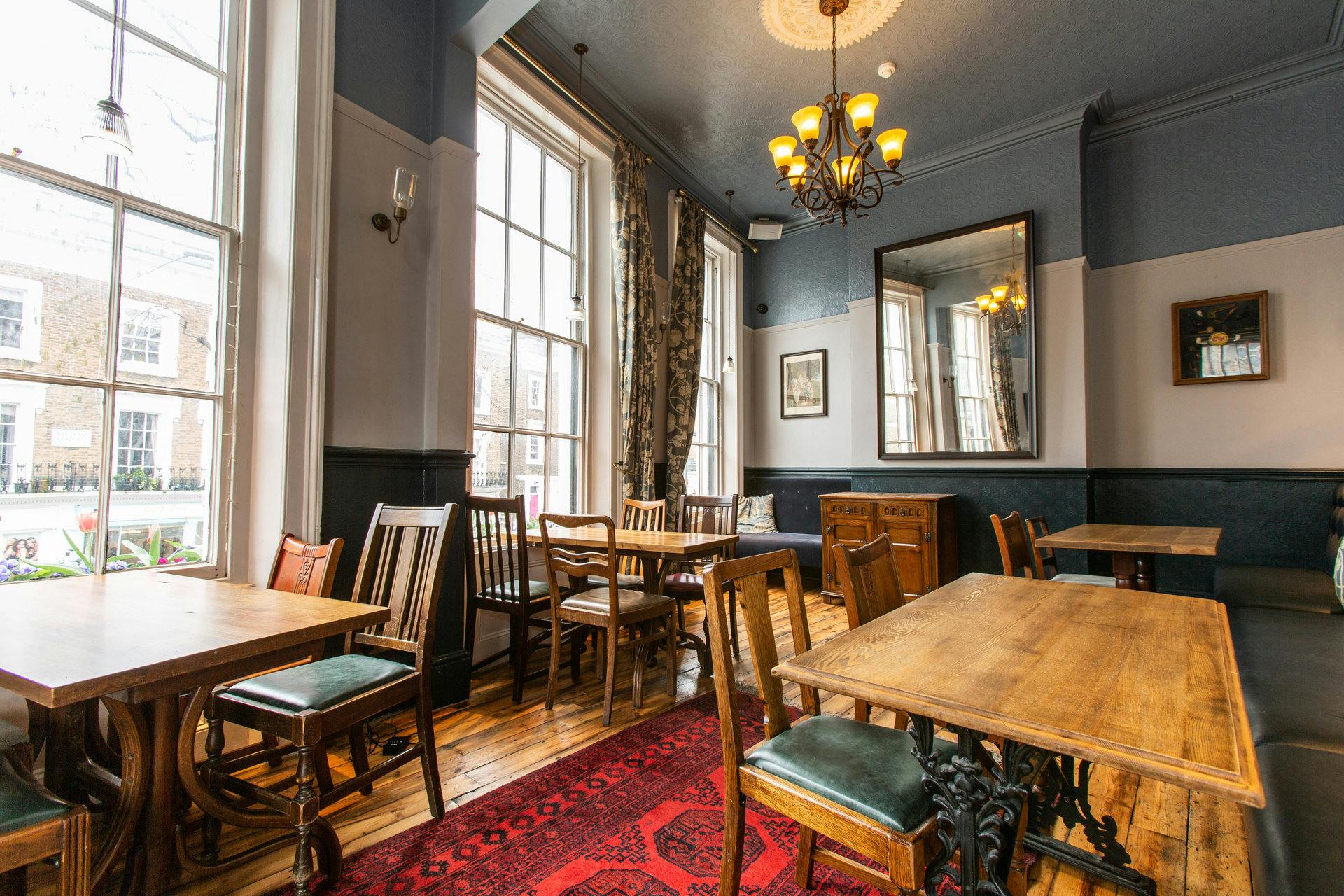 Refined Victorian corner pub with upstairs dining room, serving ales